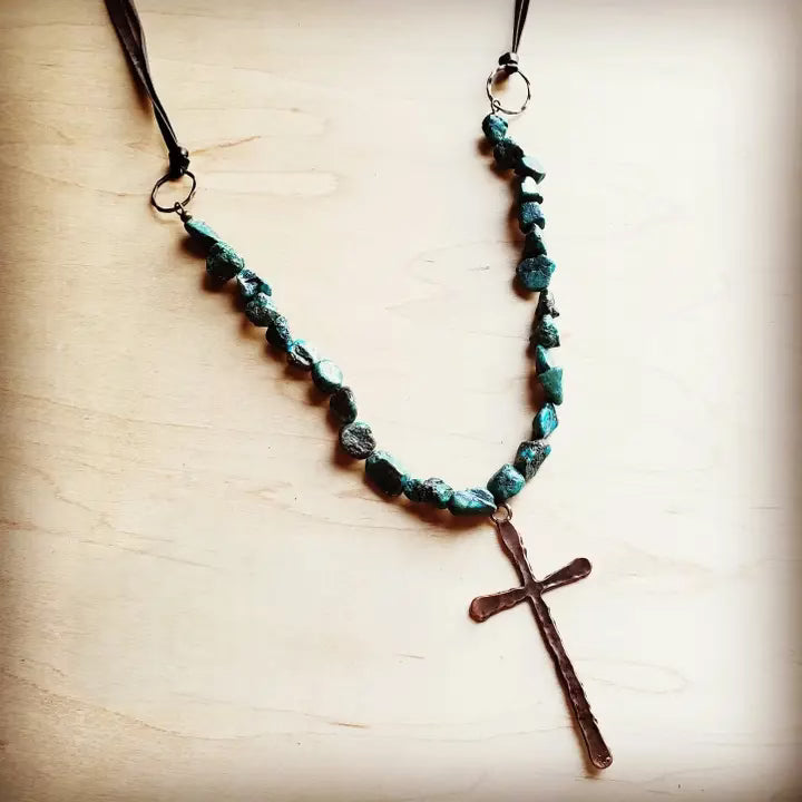 Turquoise beaded necklace with copper cross pendant