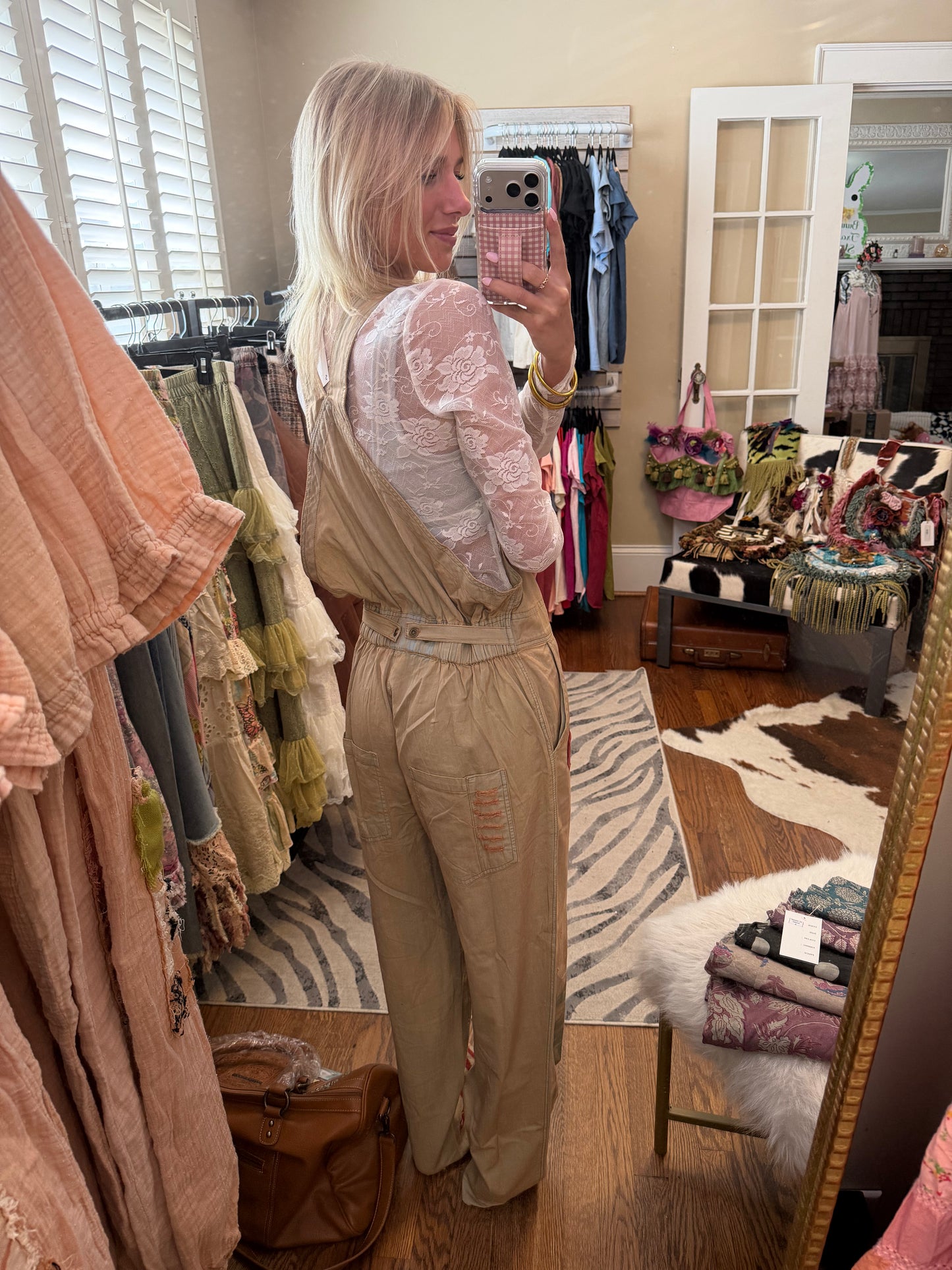 Embroidered overalls, relaxed, fitted, distressed design with all of her prints and patches – khaki