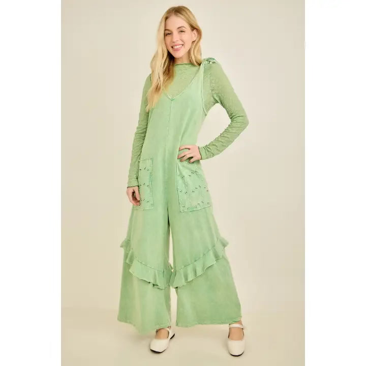 Mineral wash jumpsuit with eyelet pockets and ruffles