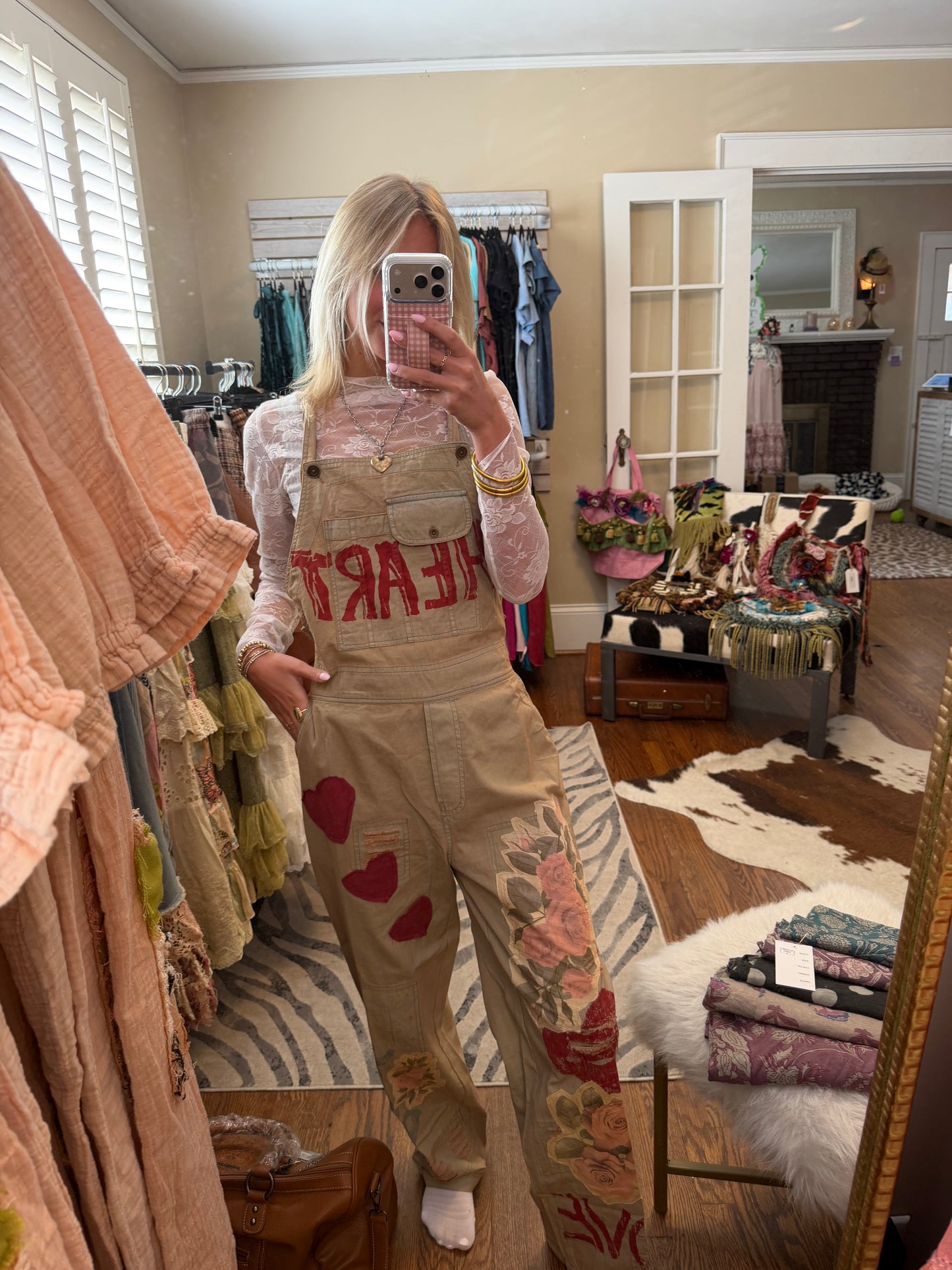 Embroidered overalls, relaxed, fitted, distressed design with all of her prints and patches – khaki